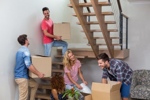 Local removal team preparing a move in Crystal Palace with boxes and furniture