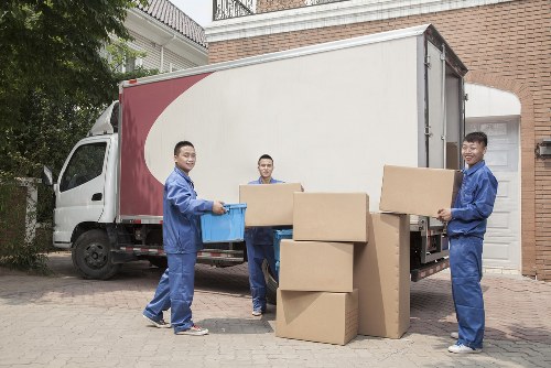 Man with van moving boxes during a customer booking process
