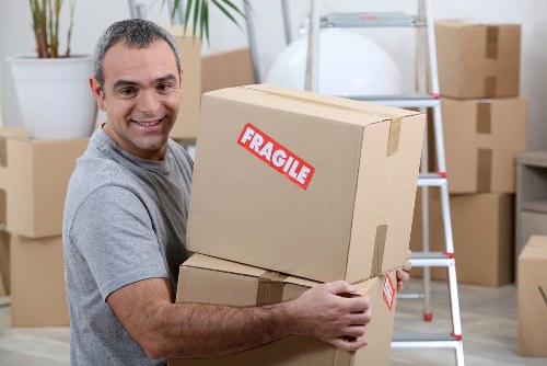 Same day removal team handling furniture in Crystal Palace