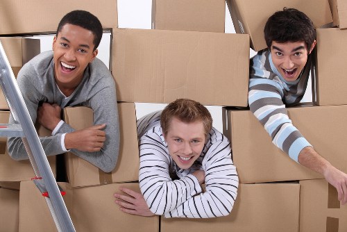 Removal team loading household furniture in Crystal Palace