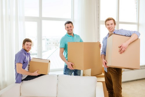 Packed moving boxes ready for transport during a local relocation
